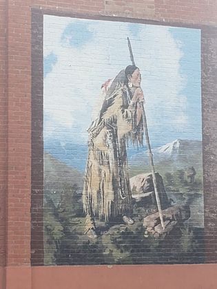 Mural 6 - depicts Sacajawea overlooking the three forks of the Missouri River. 