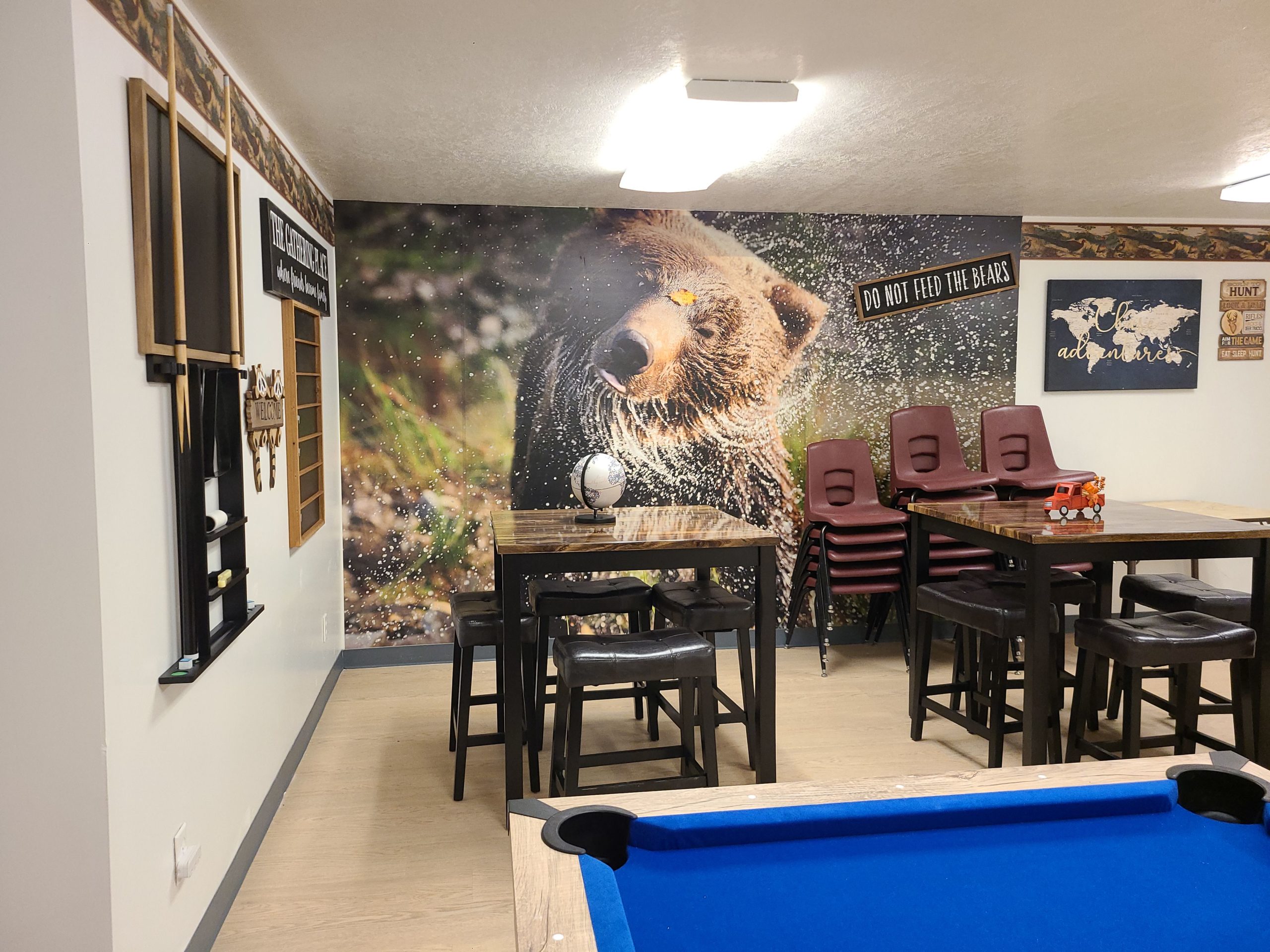 Tables and a pool table in our game room